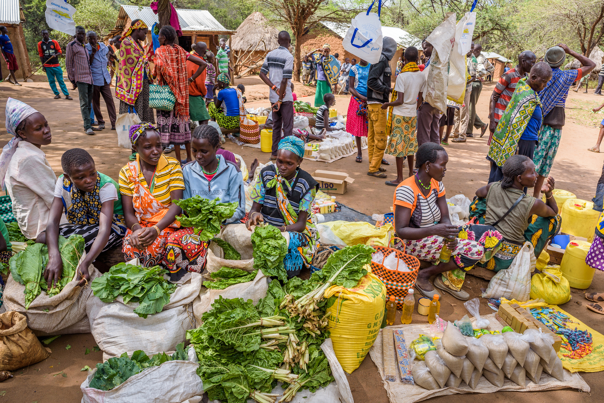 group of women selling at the local market