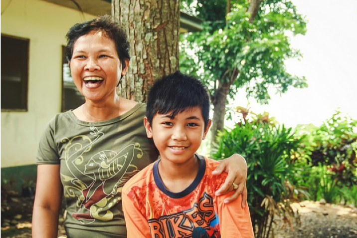 Arlene with her son Miko that she is able to provide for because of her business