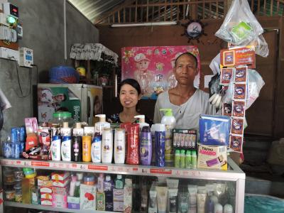 Store owner and his daughter in Myanmar