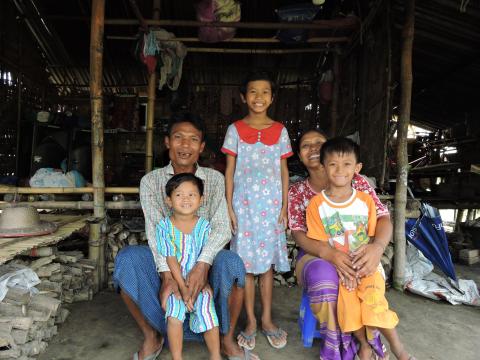 Family of five inside home in Myanmar