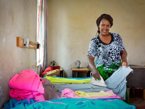 Zambia woman who has clothes making business