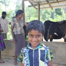 Five-year old Asanka smiles for camera